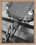 Poster Master Woman Under Classic Car Poster by PosterMaster