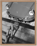 Poster Master Woman Under Classic Car Poster by PosterMaster