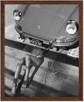 Poster Master Woman Under Classic Car Poster by PosterMaster