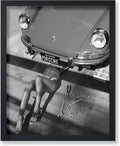 Poster Master Woman Under Classic Car Poster by PosterMaster